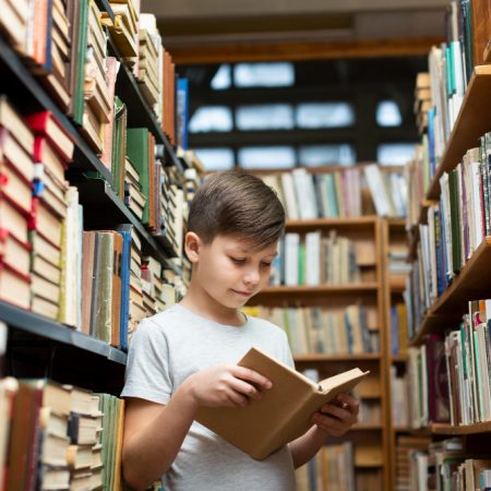 low-angle-boy-library-reading